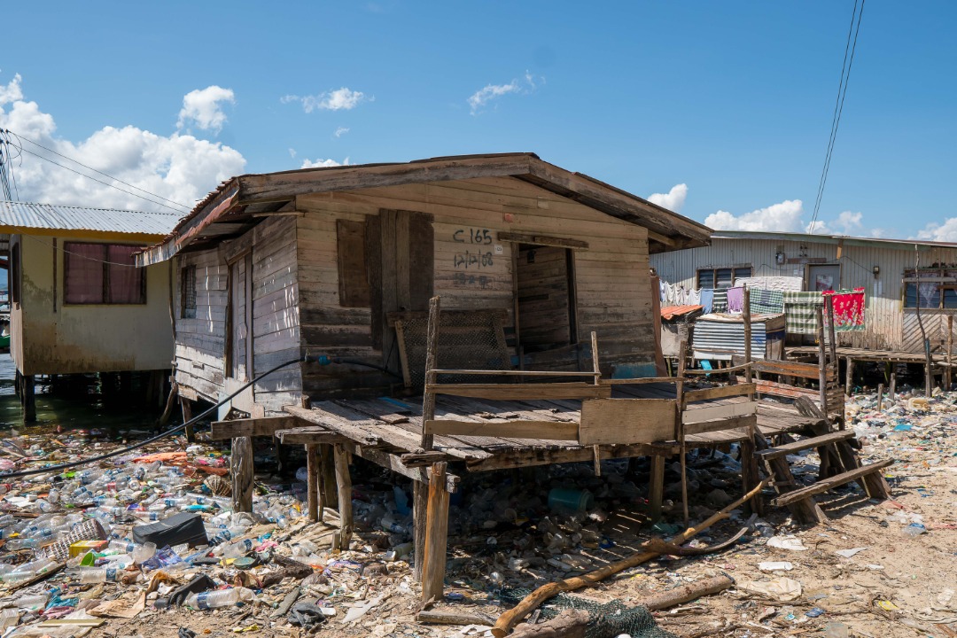 Rebuilding Almost Collapsed Houses of Poor and Beautifying Pulau Gaya